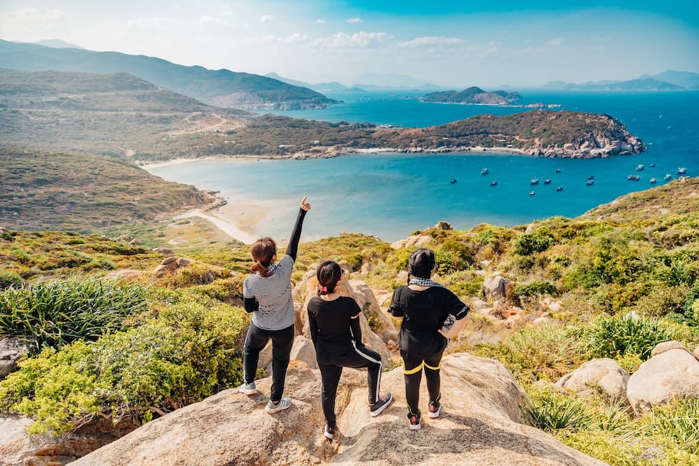 three women hiking during their annual leave in Ireland