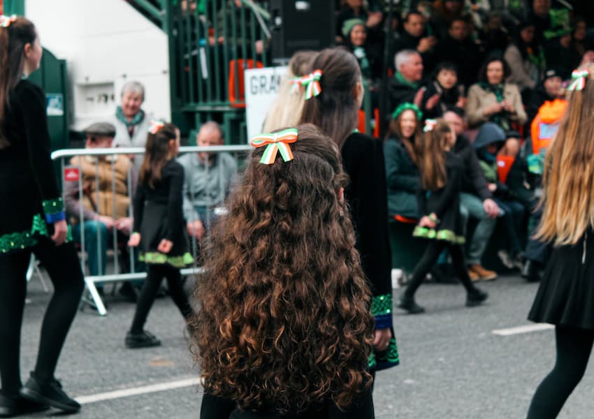 people marching in a St Patricks day parade in Ireland during a public holiday